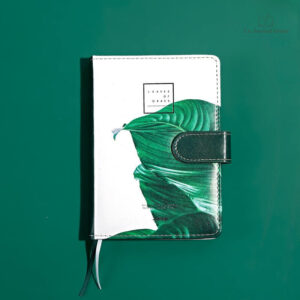 Carnet de notes vert pour écrire ses pensées
